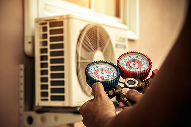 Professional Emergency Hvac technician working in Apulia Station, NY